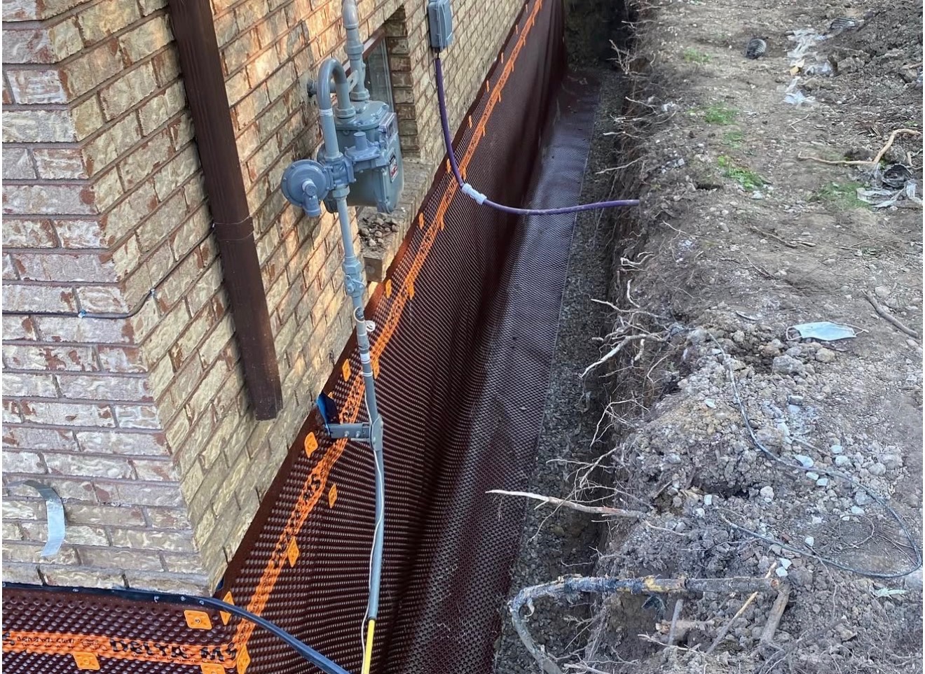 Sump pump pit installation